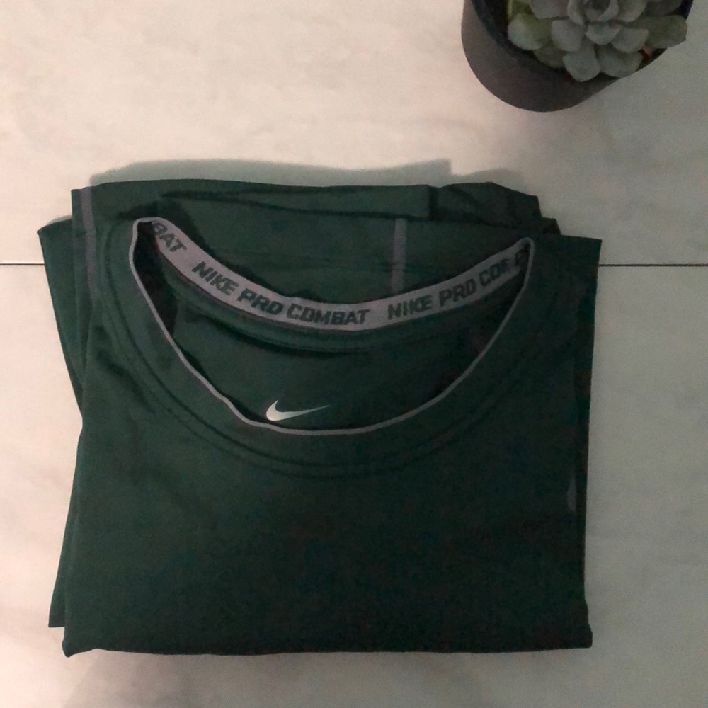 Dark green Nike shirt